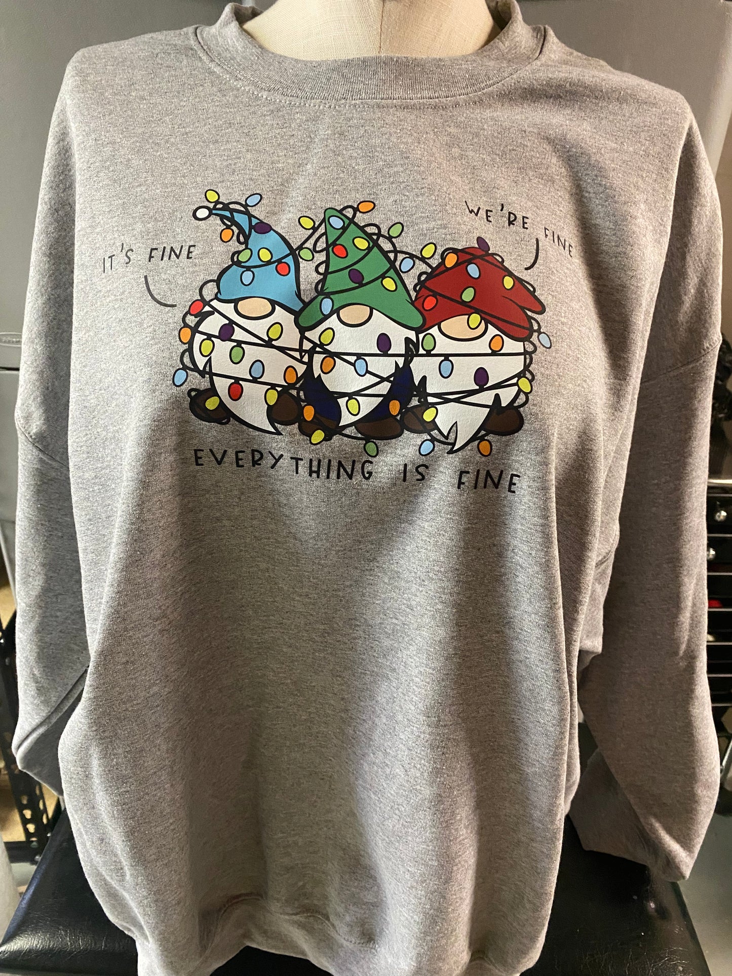 It’s Fine, We’re Fine, Everything’s Fine Gnomes in Tangled Lights Crewneck